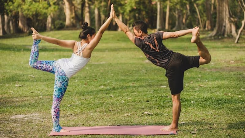 3 Partner Yoga Poses to Try with Your Friends or Family